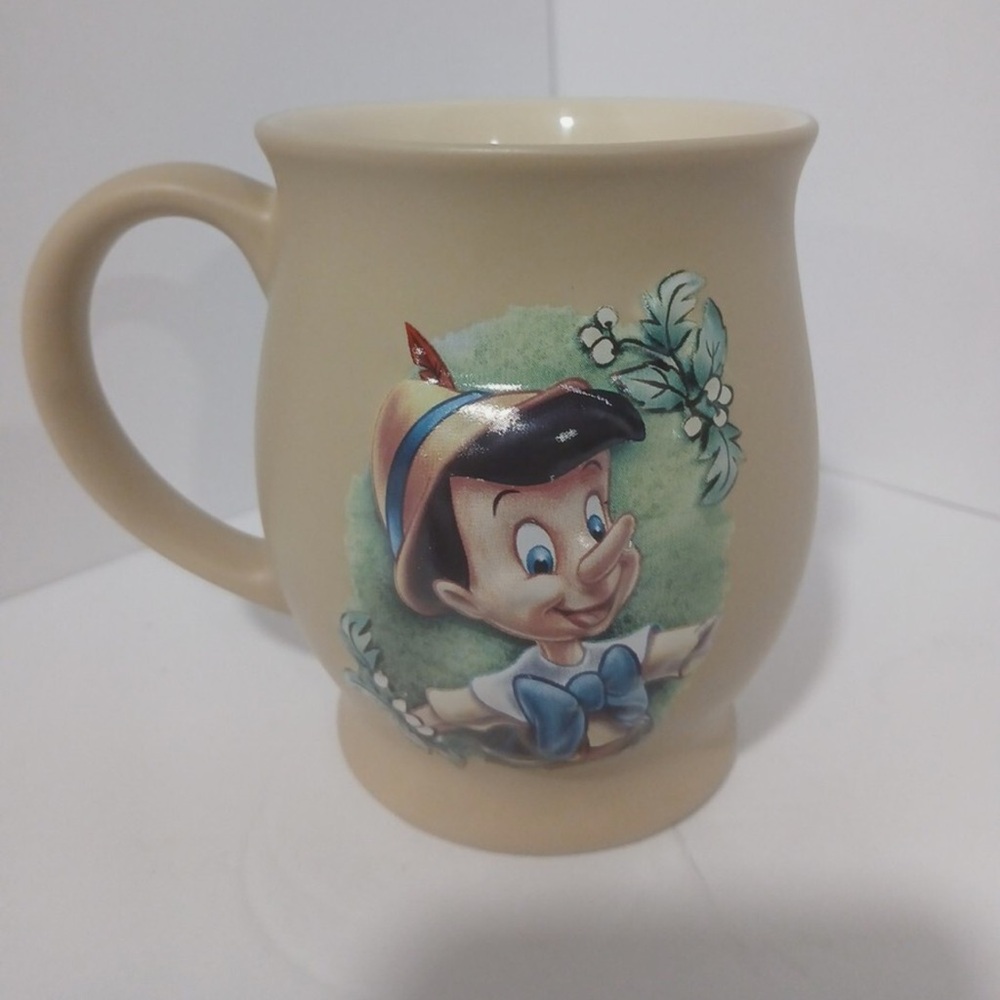 Disney Store 3D Embossed Pinocchio 16oz Tan Coffee Mug